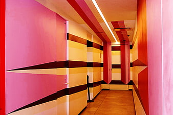 Vibrant Pink and Yellow Geometric Hallway Interior