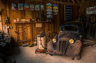 Vintage Rusty Car in Old Wooden Garage with Tools