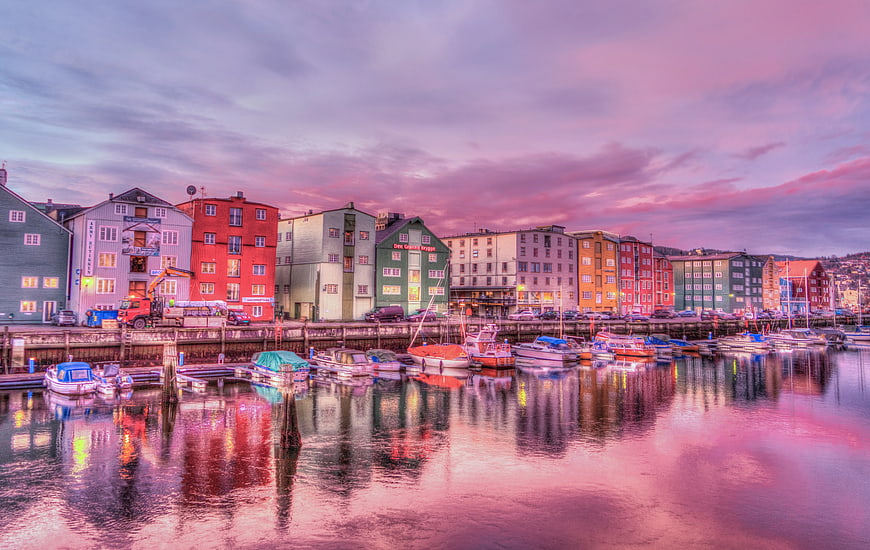 Colorful wooden houses in Bergen harbor at sunset