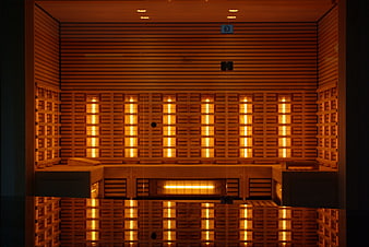 Modern Infrared Sauna Interior with Wooden Panels and Warm Lighting