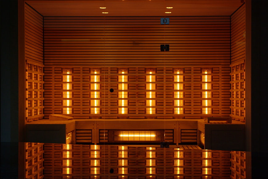 Modern Infrared Sauna Interior with Wooden Panels and Warm Lighting