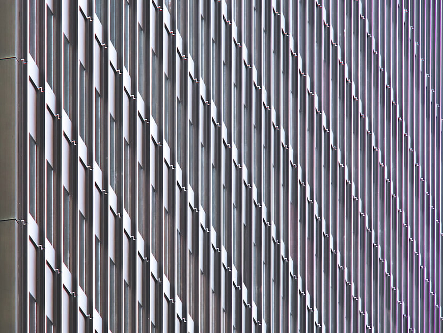 Abstract Modern Building Facade with Vertical Metal Strips