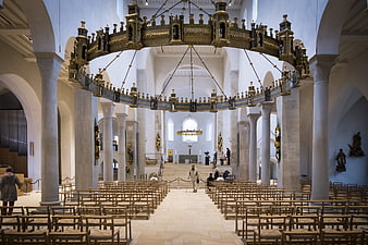 Interior of a Cathedral with Massive Ornate Chandelier