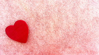 Red Heart on Pink Textured Background