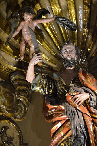 Baroque wooden sculpture of Saint Bartholomew with angel