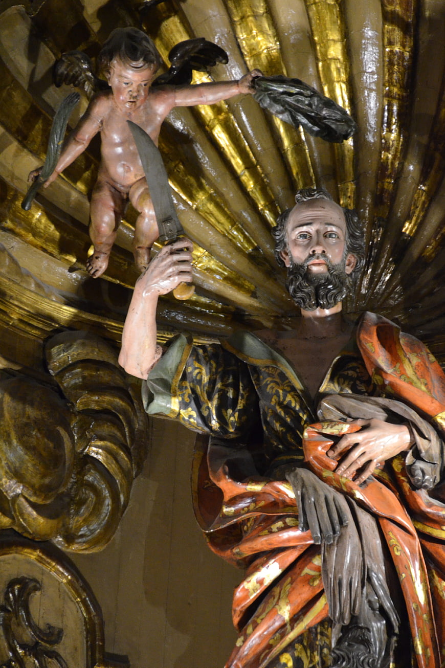 Baroque wooden sculpture of Saint Bartholomew with angel