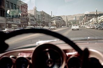 Vintage POV Driving Downtown Street Scene