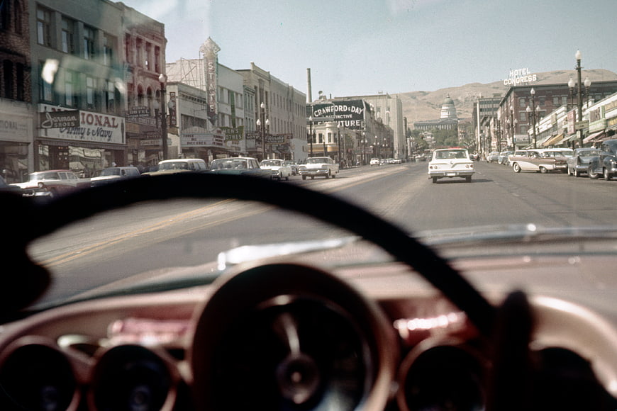 Vintage POV Driving Downtown Street Scene