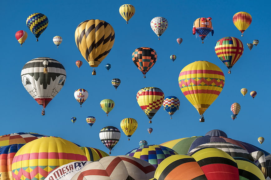 Colorful Hot Air Balloons Flying in Blue Sky