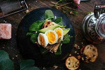 Healthy Avocado Toast with Soft Boiled Eggs on Dark Slate