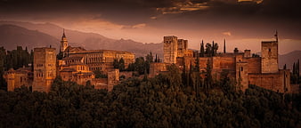Alhambra Palace at Sunset with Mountains