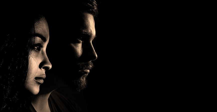 Dramatic Sepia Profile Portrait of Man and Woman in Shadows