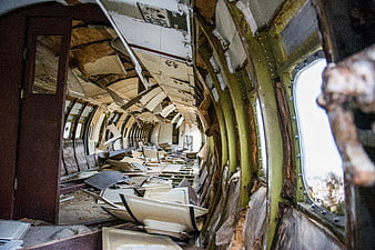 Interior of Abandoned Train Carriage with Debris