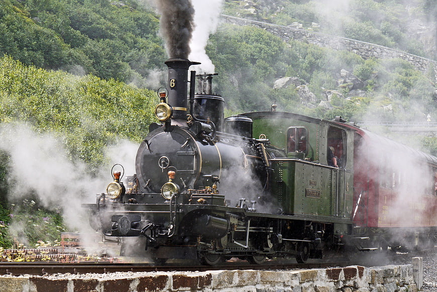 Vintage Steam Locomotive 6 on Mountain Railway Track