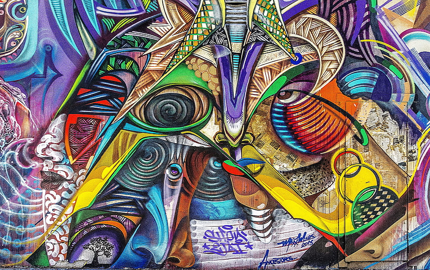 Vibrant Abstract Graffiti Mural with Psychedelic Patterns