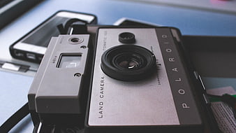 Vintage Polaroid Land Camera Close-Up on Desk
