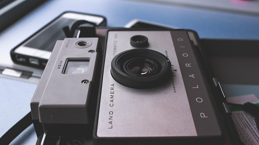 Vintage Polaroid Land Camera Close-Up on Desk