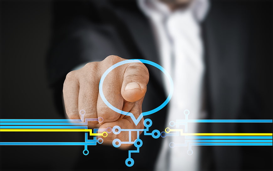Businessman touching digital circuit board interface