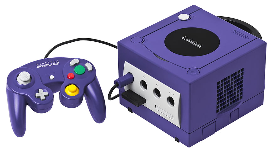 Purple Nintendo GameCube Console And Controller On White Background