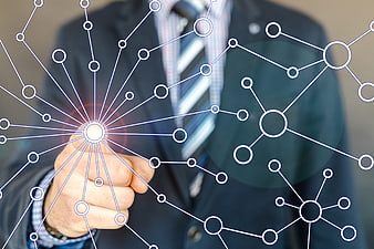 Businessman touching digital network connection nodes on glass screen