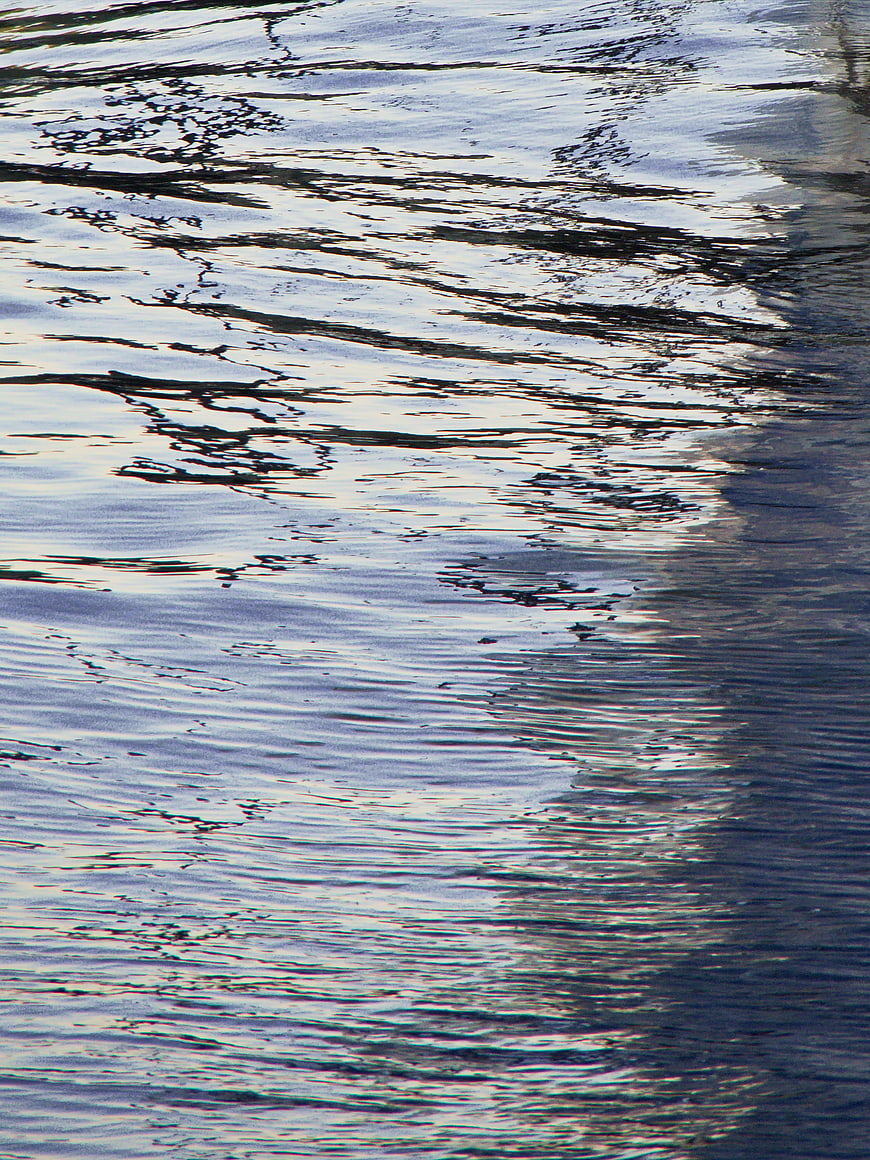 Abstract Blue Water Ripples and Reflections