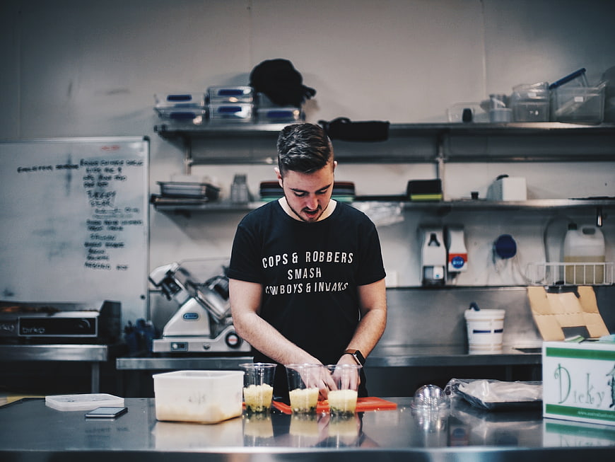 Chef preparing food in commercial kitchen