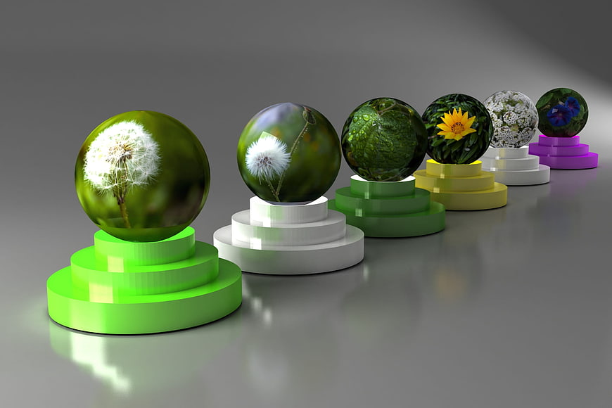3D Rendered Glass Spheres with Nature Textures on Pedestals