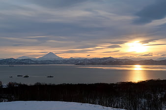 Sunset over Avacha Bay with Mount Avachinsky and Ships