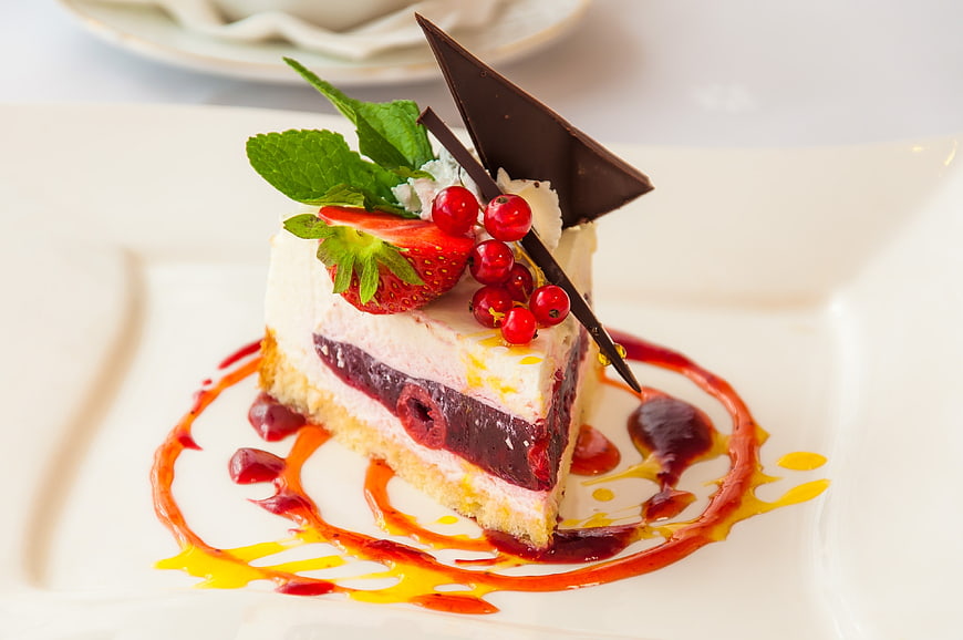 Elegant Strawberry Berry Cream Cake Slice With Mint And Chocolate