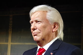 Close-up of Donald Trump wax figure in suit and red tie