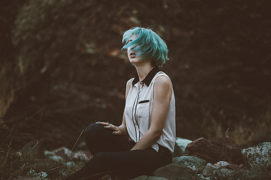 Woman with Blue Hair Meditating in Nature