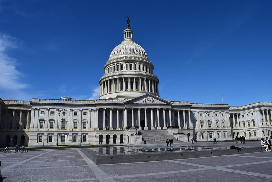 United States Capitol Building Front View Under Blue Sky
