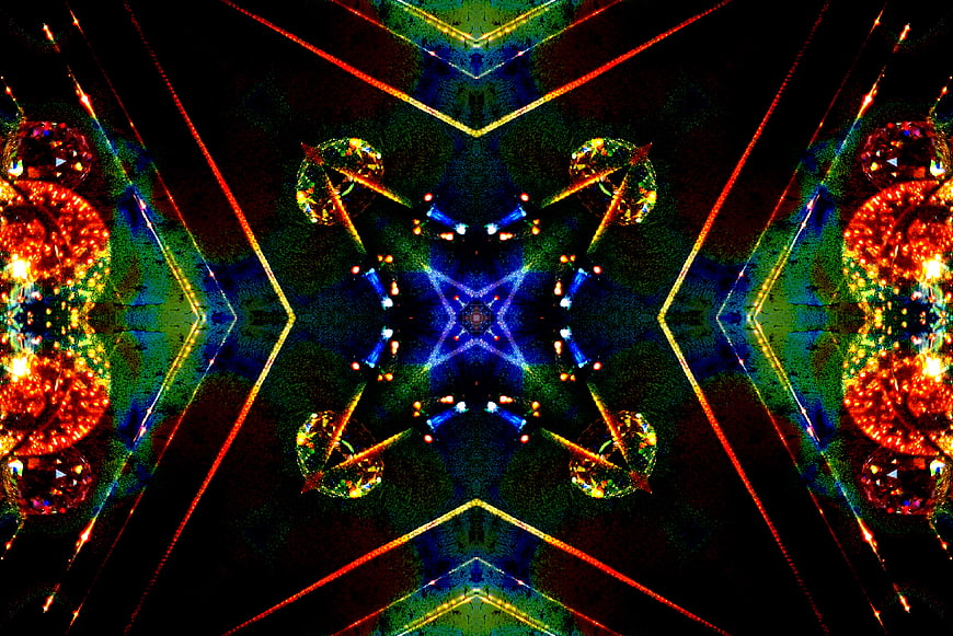 Abstract kaleidoscope pattern with glowing geometric shapes