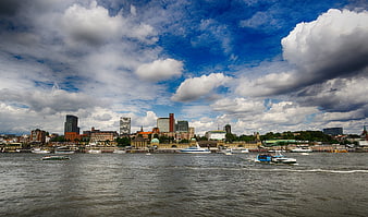 Hamburg Landungsbrücken Skyline with Boats and Clouds