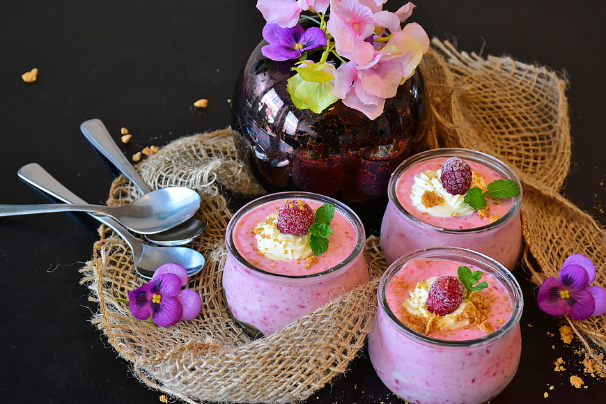 Raspberry Quark Dessert Jars With Cream And Flowers