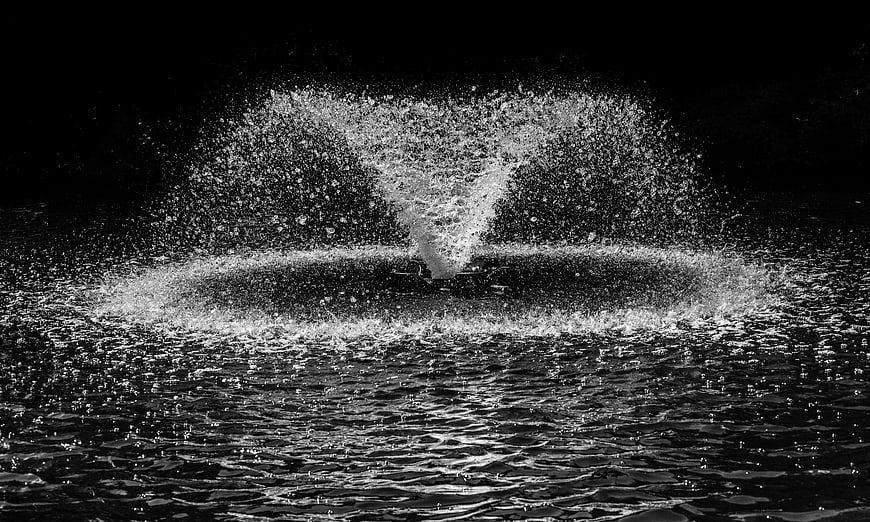 Black and white fountain water splash burst