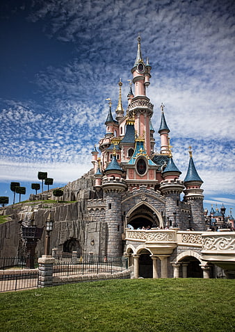 Disneyland Paris Castle Under Blue Sky with Clouds
