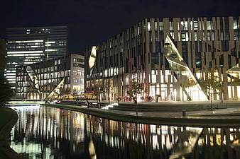 Modern Kö Center Architecture at Night with Water Reflection