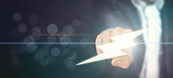 Businessman Holding Glowing Lightning Bolt Concept