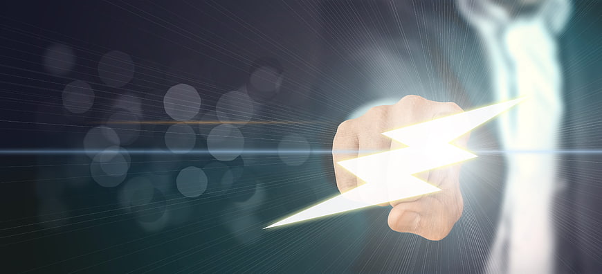 Businessman Holding Glowing Lightning Bolt Concept