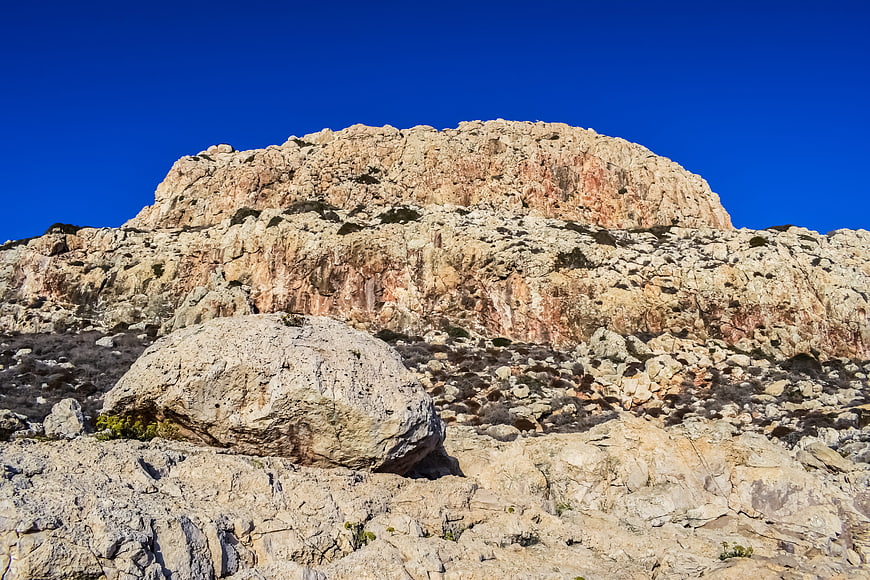 Rugged limestone cliffs and boulders in Cape Greco, Cyprus