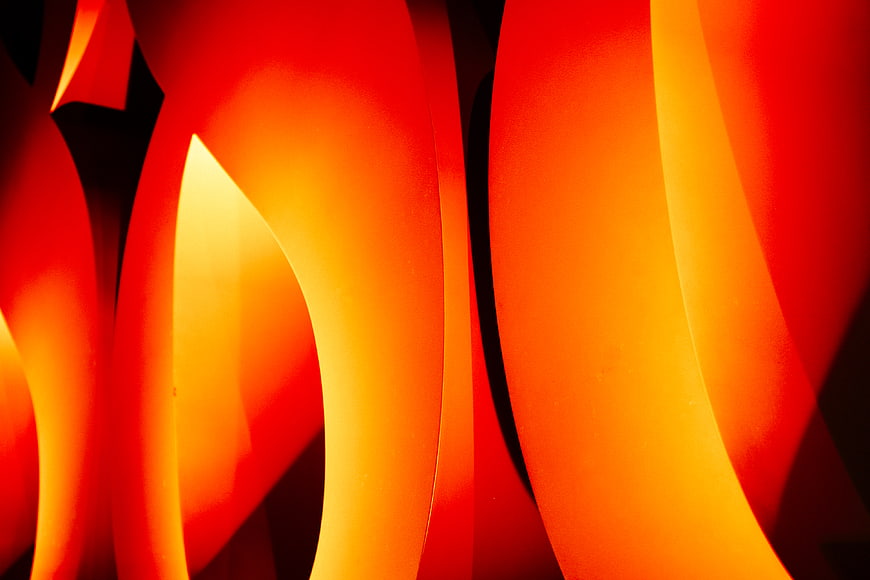 Abstract Red and Orange Curved Shapes Background