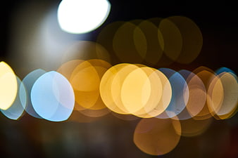 Abstract Blue and Yellow Bokeh Lights Background