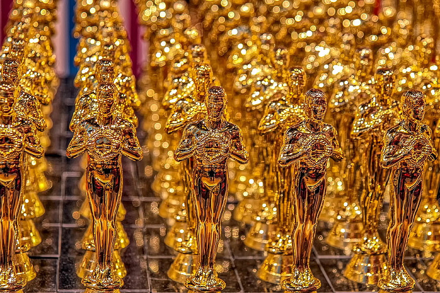 Rows of Golden Oscar Statuettes on Display
