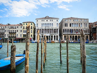 Venice Grand Canal with Wooden Piles and Boats