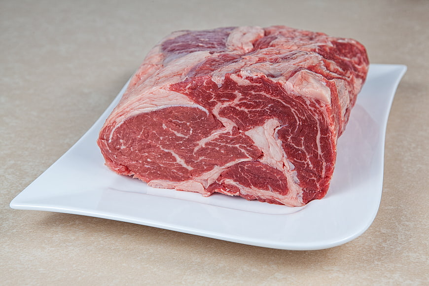 Raw Beef Roast on White Plate