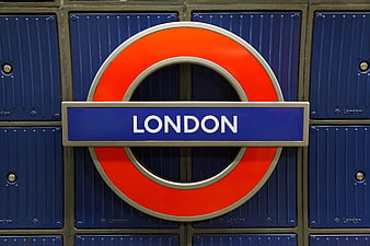 London Underground Roundel Sign on Blue Locker Background