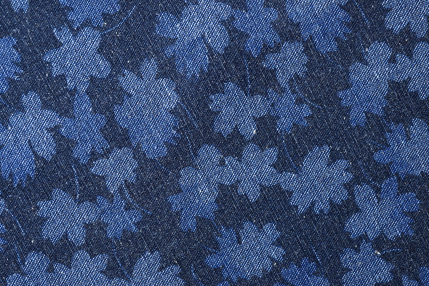 Blue Floral Denim Fabric Texture Closeup