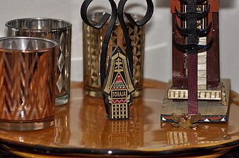 Toraja cultural souvenir and decorative glasses on amber tray