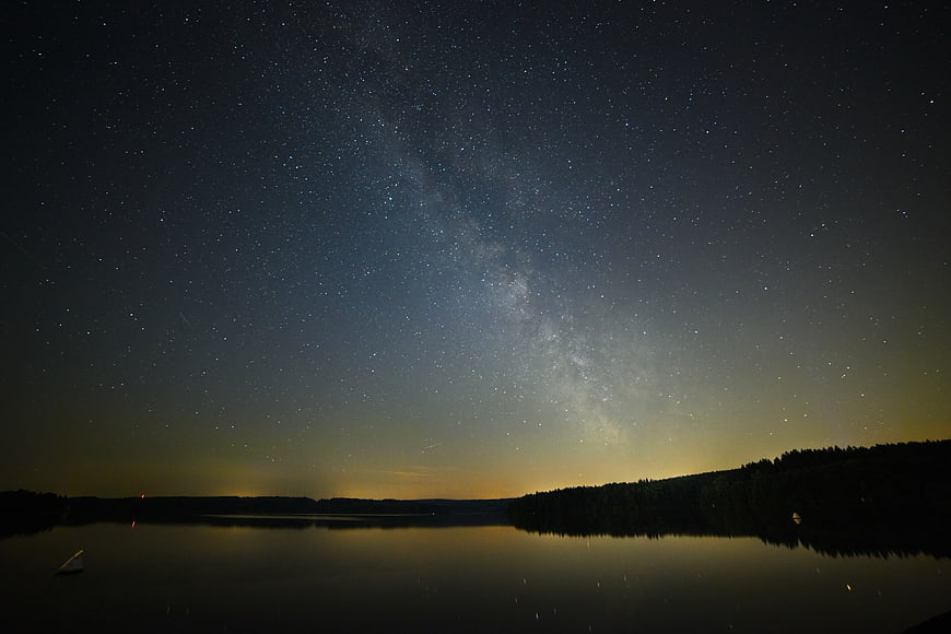 Milky Way Galaxy Over Calm Lake Night Sky Landscape